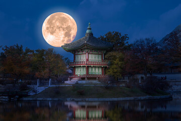  Gyeongbokgung Palace with Full moon
 in Seoul South Korea