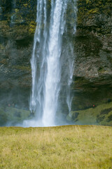 Kvernufoss a 30-meters high waterfall accessible via a rugged hiking trail in Iceland