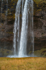 Kvernufoss a 30-meters high waterfall accessible via a rugged hiking trail in Iceland