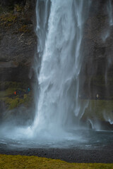 Kvernufoss a 30-meters high waterfall accessible via a rugged hiking trail in Iceland