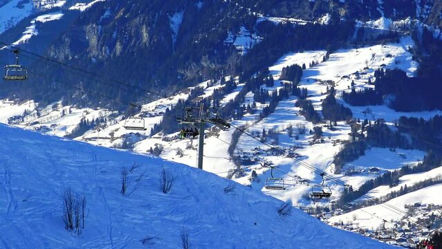 The Megeve ski lift in the Mont Blanc massif in Europe, France, Rhone Alpes, Savoie, the Alps, in winter, on a sunny day. 