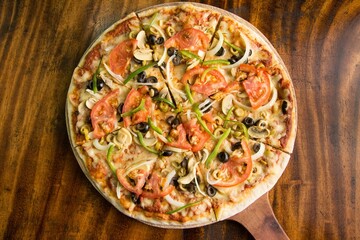pizza on a wooden table