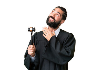 Naklejka premium Judge caucasian man over isolated chroma key background looking up while smiling