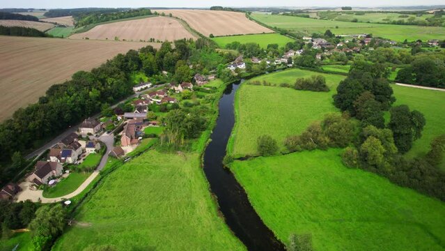 Aerial shot of River Avon and surrounding countryside and villages, Wiltshire UK