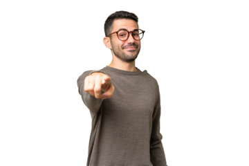 Young handsome caucasian man over isolated background pointing front with happy expression