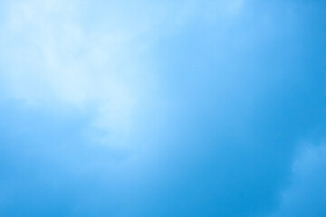 Blurred blue sky with rain cloud. Abstract background.