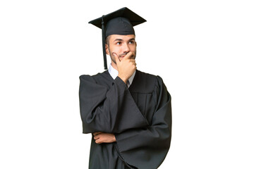 Young university graduate man over isolated background having doubts and with confuse face expression