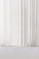 Obraz premium White or light gray curtain fabric texture and background. Large wall curtain. Curtain for hotel presentations. Cream colored cloth. 