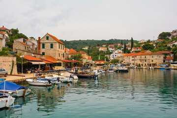 Fototapeta na wymiar The historic port village of Maslinica on Solta Island in Split-Dalmatia County, Croatia