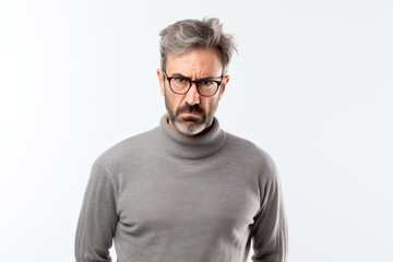 Fototapeta premium Anger European Man In Gray Sweater On White Background