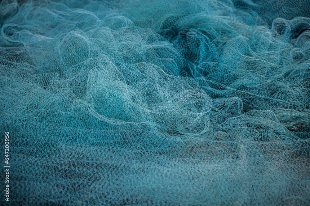 Wall mural blue fishing net, fisherman hunting tools, net rope texture / pattern net / abstract / background.
