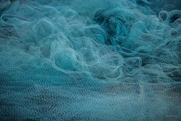 Foto op Canvas Blue Fishing net, Fisherman hunting tools, net rope texture / pattern net / Abstract / Background. © Silapavet