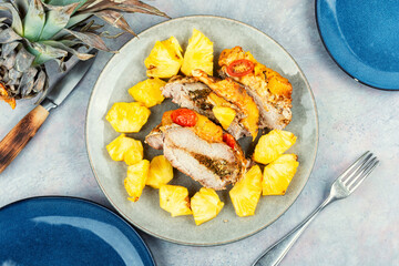 Pork meat baked with pineapple.