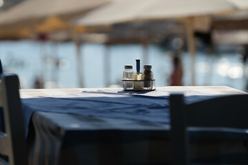 Fototapeta na wymiar salt and pepper on the table in Greek taverns.