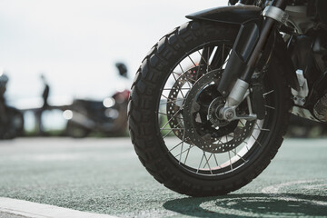 Obraz premium motorcycle in a sunny motorbike on the road riding.with sunset light. copyspace for your individual text. dry road 
