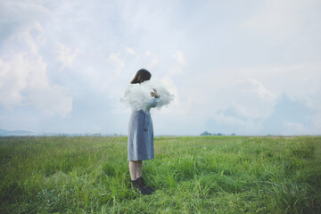 surreal woman meets and embraces a fragile cloud, abstract concept
