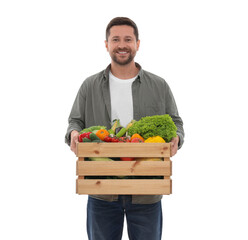 Harvesting season. Happy farmer holding wooden crate with vegetables on white background