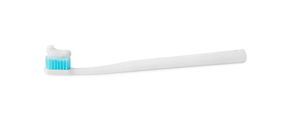 Plastic toothbrush with paste on white background