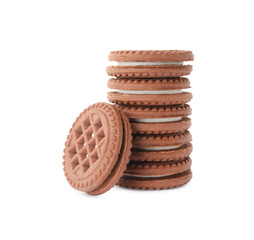 Stack of tasty chocolate sandwich cookies with cream isolated on white