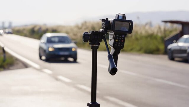 Mobile police radar for traffic speed control on road, slow motion