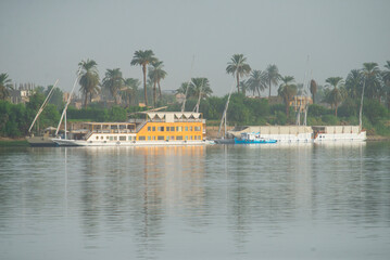 Large egyptian river cruise dahabeya boats moored on Nile