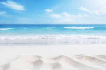 Closeup white sand with blurred sea background