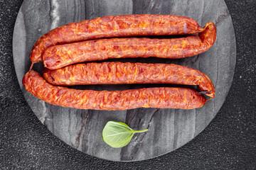 sausage smoked meat beef fresh appetizer meal food snack on the table copy space food background rustic top view