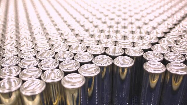 Conveyor line with the production of aluminum cans. Production of aluminum cans for drinks. Plant of high-tech equipment for the food industry.