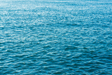 Obraz premium Deep turquoise water wave backgriund