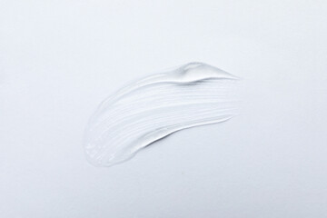 Swatch of cosmetic gel on white background, top view