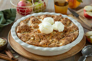 delicious apple and almond cake with vanilla ice cream,