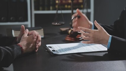 .Businessman shaking hands to seal a deal with his partner lawyers or attorneys discussing a contract agreement