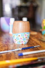 typical Argentinian mate with a hand-painted pattern of colourful flowers