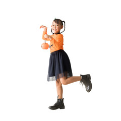 Happy Asian child girl wear halloween witch costume with holding pumpkin standing posing full body portrait, isolated on white and transparent background