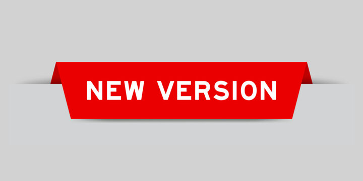 Red color inserted label with word new version on gray background