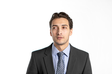 Handsome and interesting businessman in black suit thinking isolated on white background