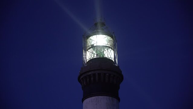 Lighthouse seen from below at night in the western France