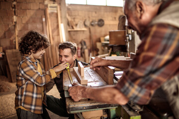 Three Generations in Carpentry: Son, Father, Grandfather