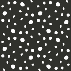 Ditsy seamless pattern with white dots on black background