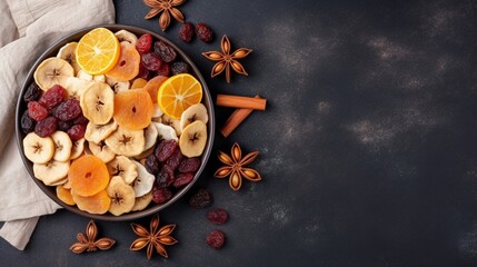 Bowl with different dried fruits on table background, top view. Healthy lifestyle with copy space