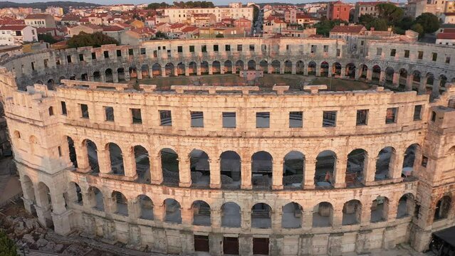 Amphitheatre in Pula, Croatia, evening aerial view. Historic centre of Pula. Ruins of roman amphitheatre. 