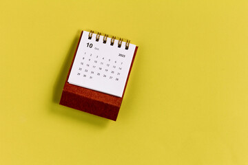October 2023. Monthly desktop calendar for 2023 on a yellow background.