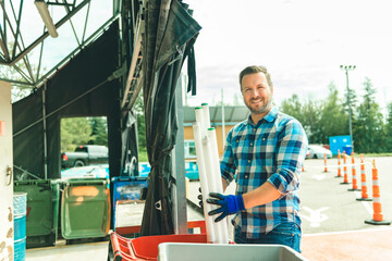 men recycling thing on a recycling center