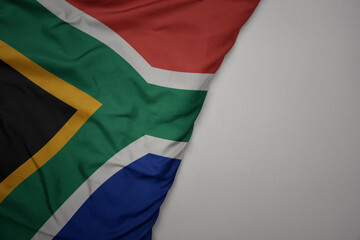 big waving national colorful flag of south africa on the gray background. - obrazy, fototapety, plakaty