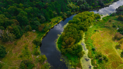 aerial landscape summer country side scenery photography top view from drone with woods field and river