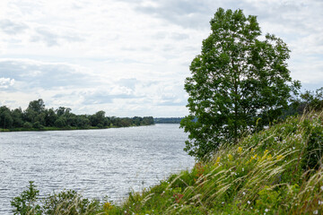 River Daugava near Aizkraukle castle mound in July in summer on a windy day in Latvia