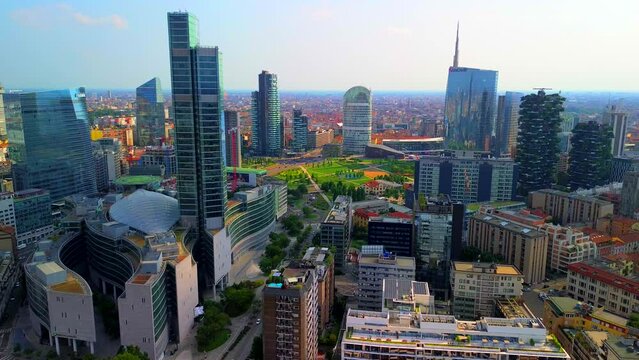 Aerial view of Milan city skyline.  the modern urban landscape of business buildings. Aerial footage showing new skyscrapers. POV. Palazzo Regione Lombardia. Milan Italy 10.2023