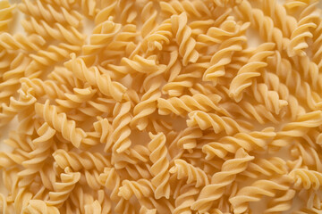 Detail from above of a texture of durum wheat semolina pasta called Fresine typical of the Amalfi coast. Gragnano pasta, bronze die, Naples Italy