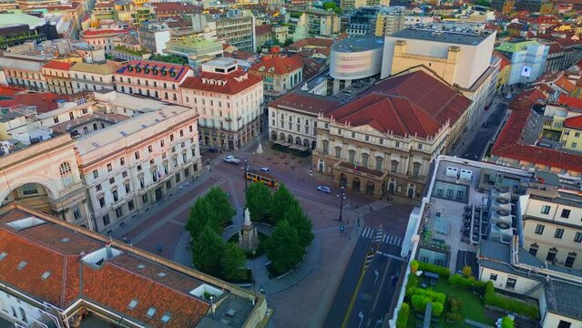Aerial view of the Old Square with a monument to the artist and inventor Leonardo da Vinci next to the La Scala opera house theatre. Vittorio Emmanuele gallery in Milan Italy 10.2023
