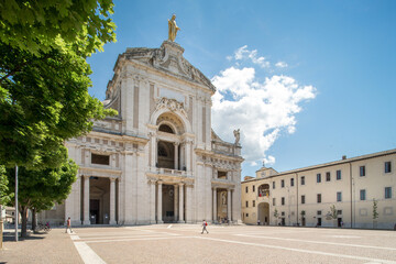 the façade of the Franciscan Basilica in Santa Maria degli Angeli , in Assisi, Umbria Italy , 3 June 2021 - obrazy, fototapety, plakaty